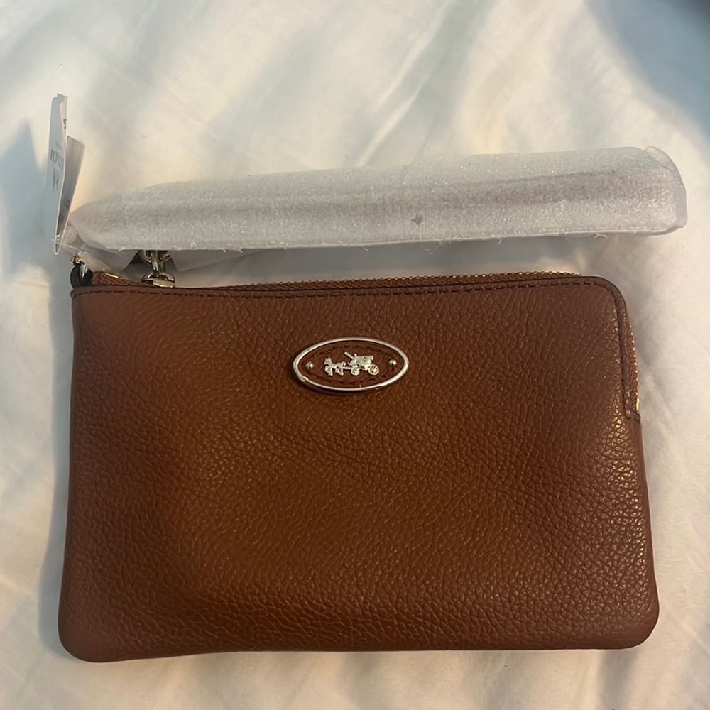 New brown and gold COACH wristlet never used
